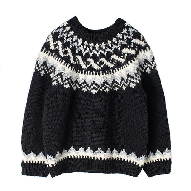A sweater knitted from the Lopi 12 no. 14 pattern, laid flat — a dark body and sleeves with the white and light grey yoke, and the same white and grey border above the ribbed hem and cuffs