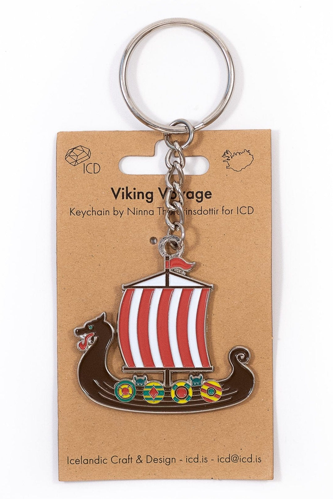 Viking ship keychain on a cardboard backing with ICD branding