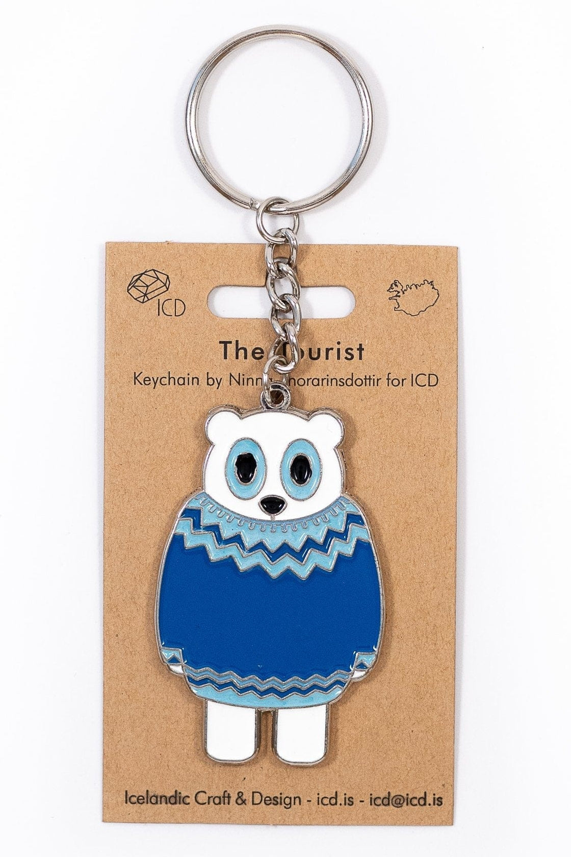 The Tourist keychain — polar bear tourist, metal keychain with enamel on both sides, Nordlings artwork by Ninna Thorarinsdottir (ICD)