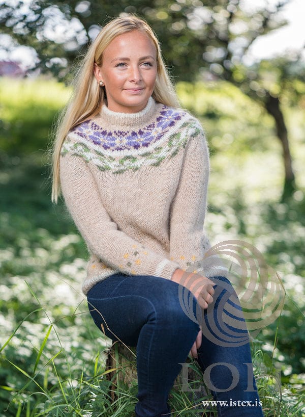 Manitoba yoke sweater in straw Léttlopi with violet flowers and green leaves (shown in the original colours)