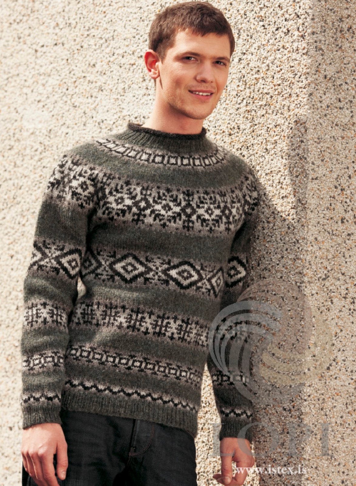 Man in the green-grey Hrím sweater — rough sea Léttlopi with light grey and black bands on the body, sleeves and yoke