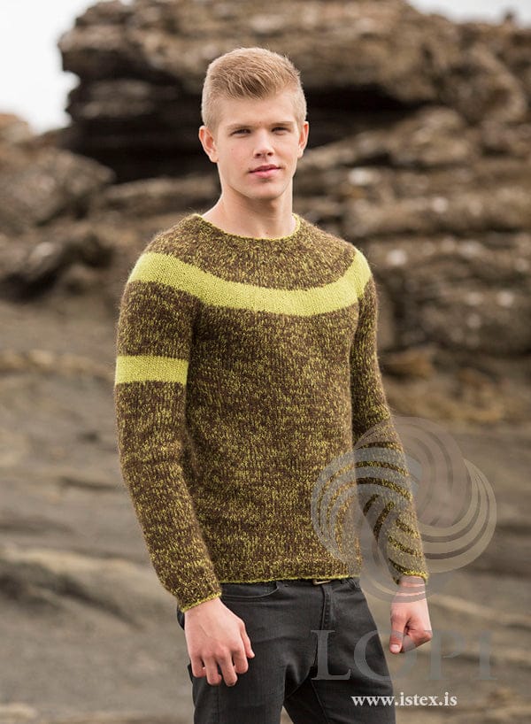 Man in the Slydda sweater — mossy brown tweed of lime Einband and chocolate Plötulopi, with lime stripes on the yoke and upper arm