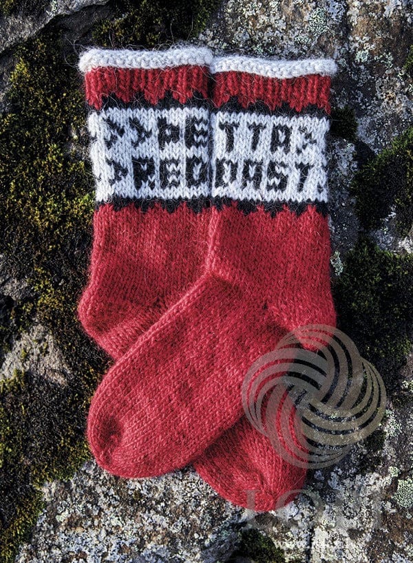 Leistar socks in crimson Léttlopi with ÞETTA REDDAST knitted around the leg