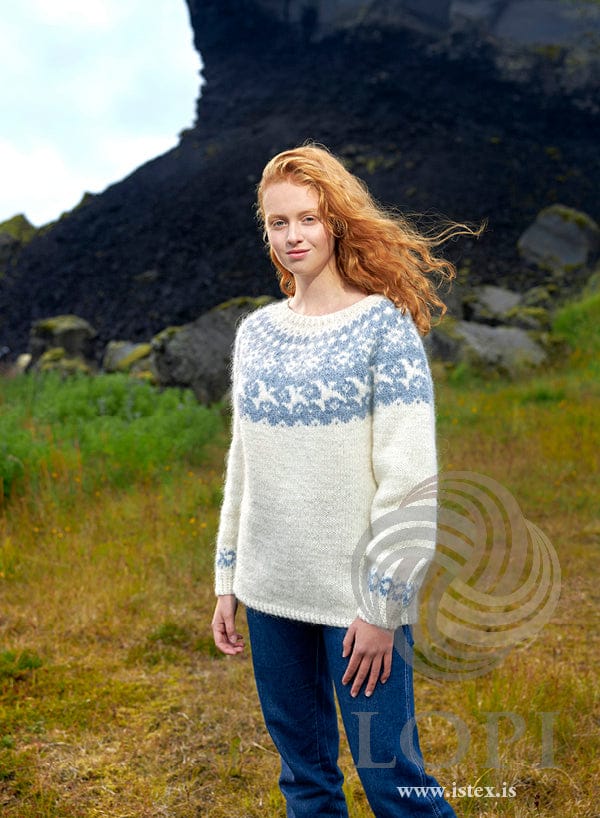 Farfuglar Icelandic yoke sweater knitted in Léttlopi — white with an air-blue yoke pattern