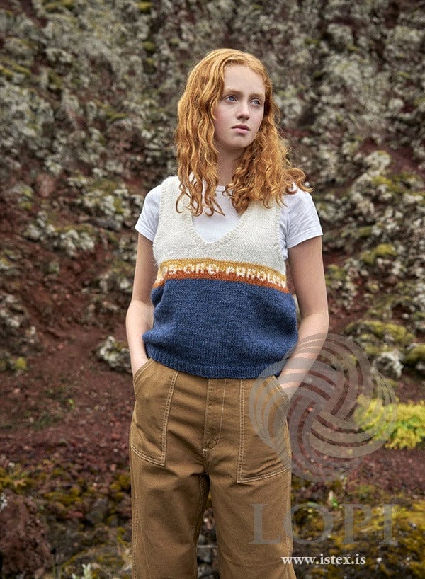 Staka vest, blue version — ocean blue below, white above and a lettered band in apricot and mimosa