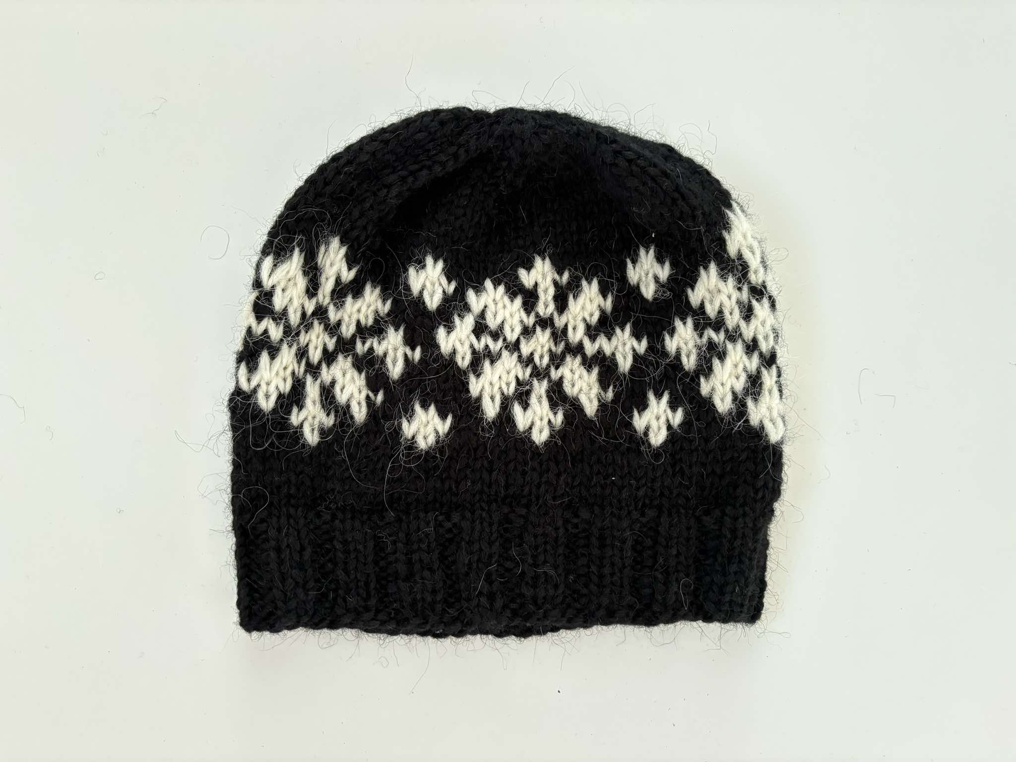 Pure wool handknit hat icelandic good snowflake pattern black or cream small, med or large. UK seller