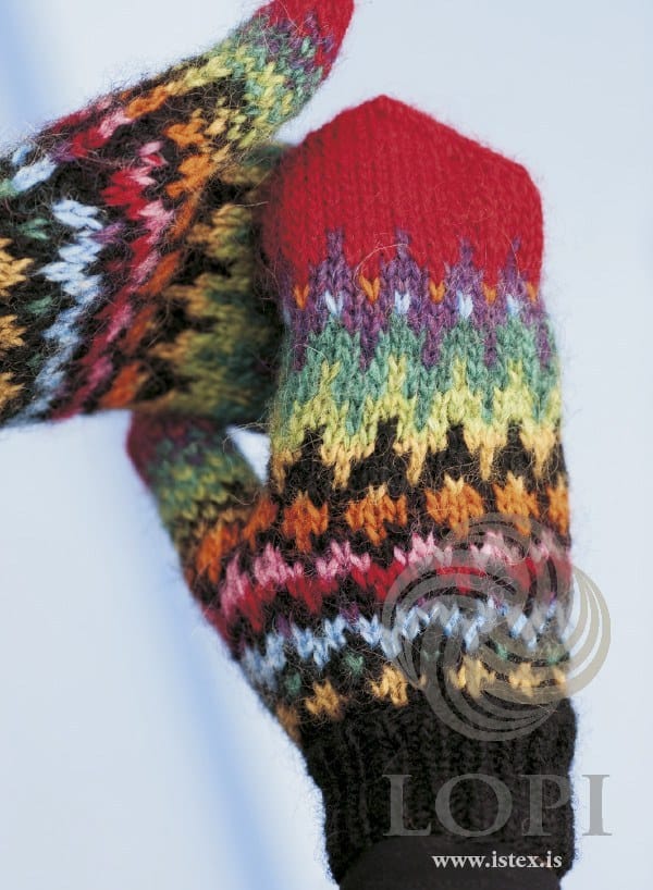 The same Handtak pattern in its black-red version, with a crimson red top — sold as a separate kit (shown in its original colours; that kit has mimosa for the mustard and apricot for the orange)