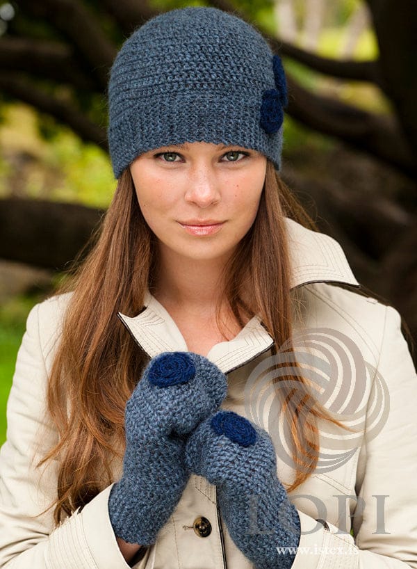 Woman in the María cap and mittens — stone blue heather crochet with navy cord spirals