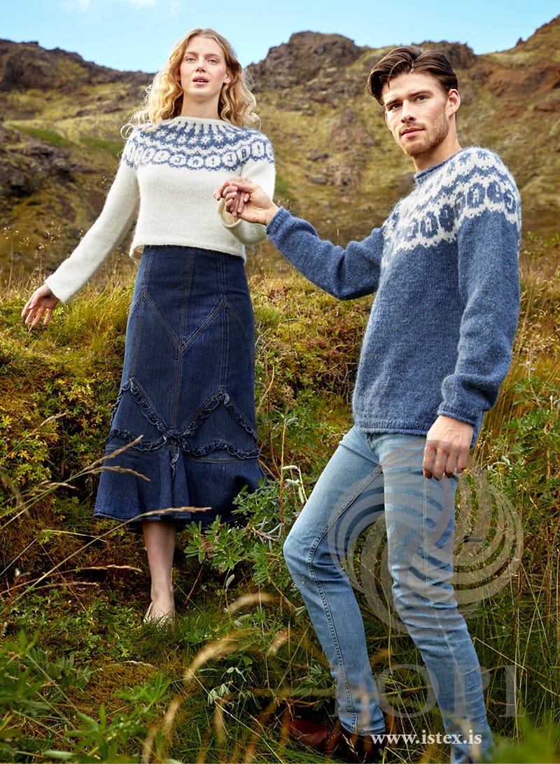 The blue classic JÁ! outdoors, worn with the white cropped version