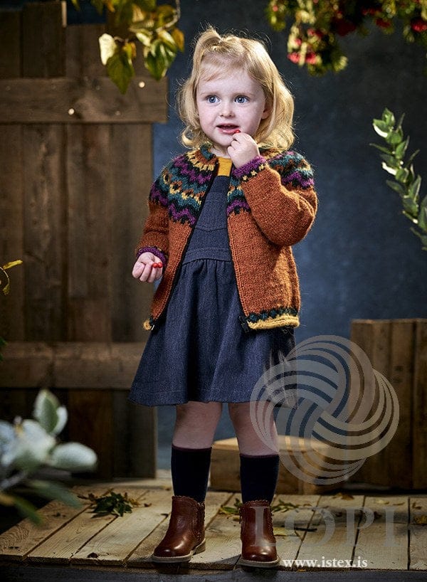Toddler girl in the apricot Sjónhvörf zip cardigan — a yoke of zigzags and diamonds in galaxy, fuchsia, lagoon and mimosa