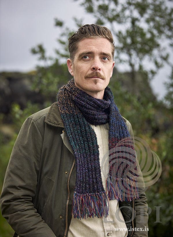 Glitta brioche scarf, dark version — black cosmos Plötulopi with deep Einband stripes and fringes