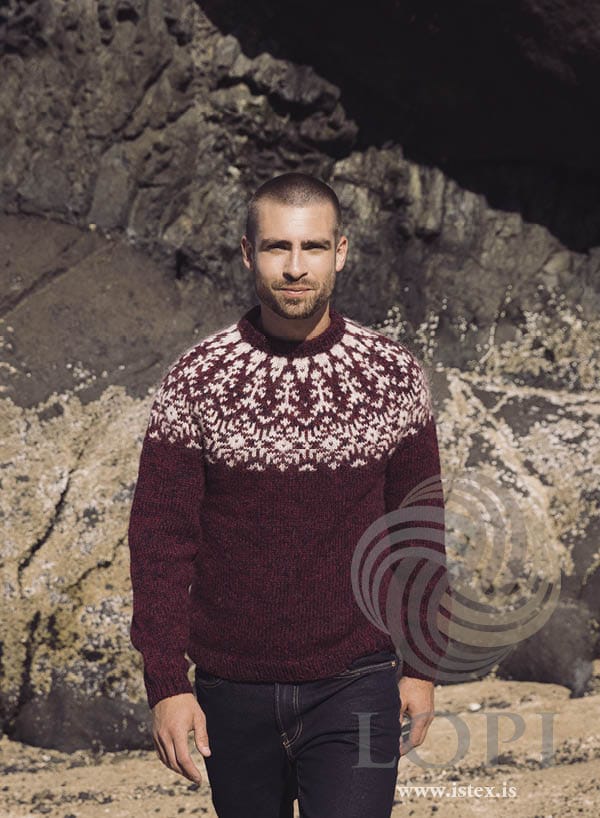 Aðventa Icelandic yoke sweater knitted in Plötulopi and Einband — deep red with an ivory and white yoke