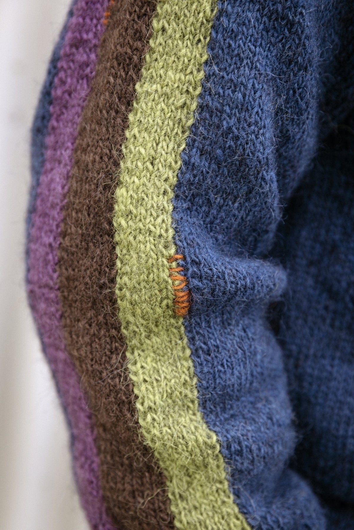 Close-up of the intarsia stripe on the Kilir sleeve