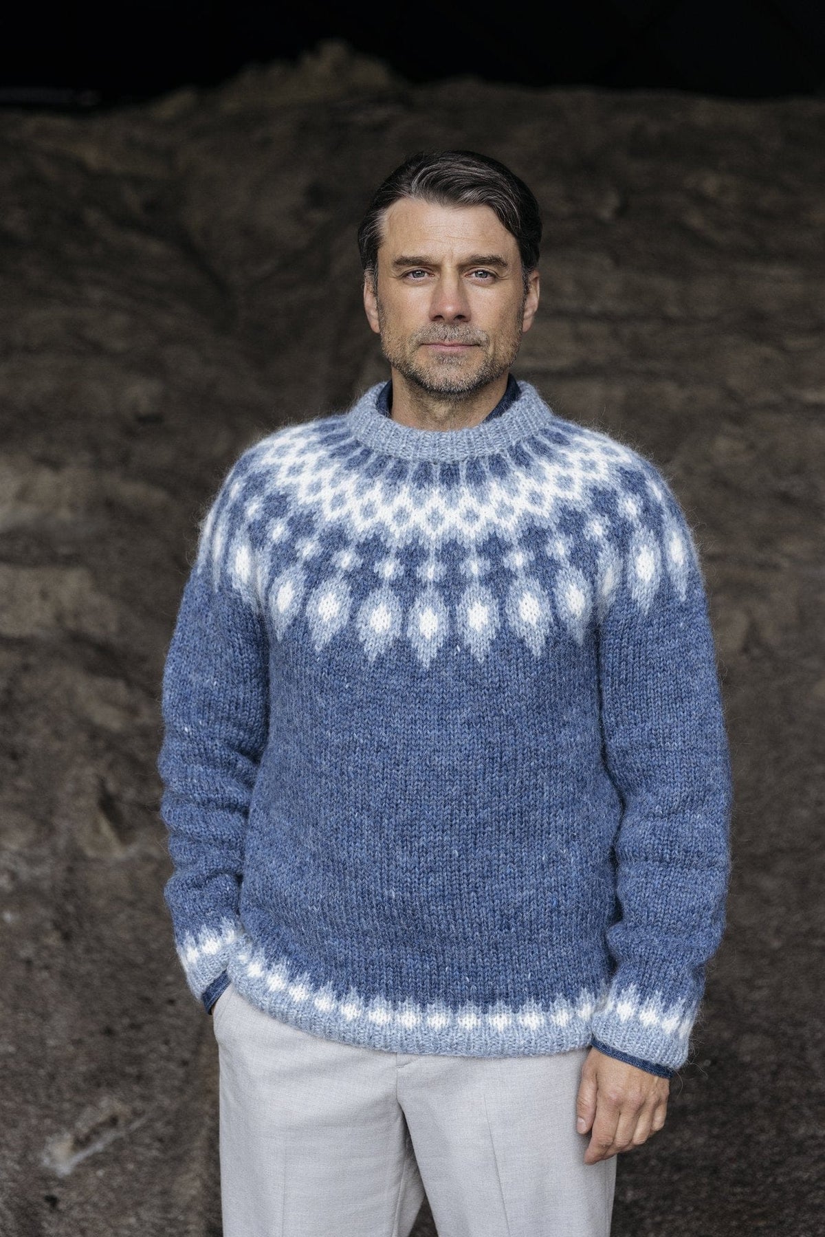 Skammdegi Icelandic yoke sweater knitted in Plötulopi — blue with a light blue and white yoke