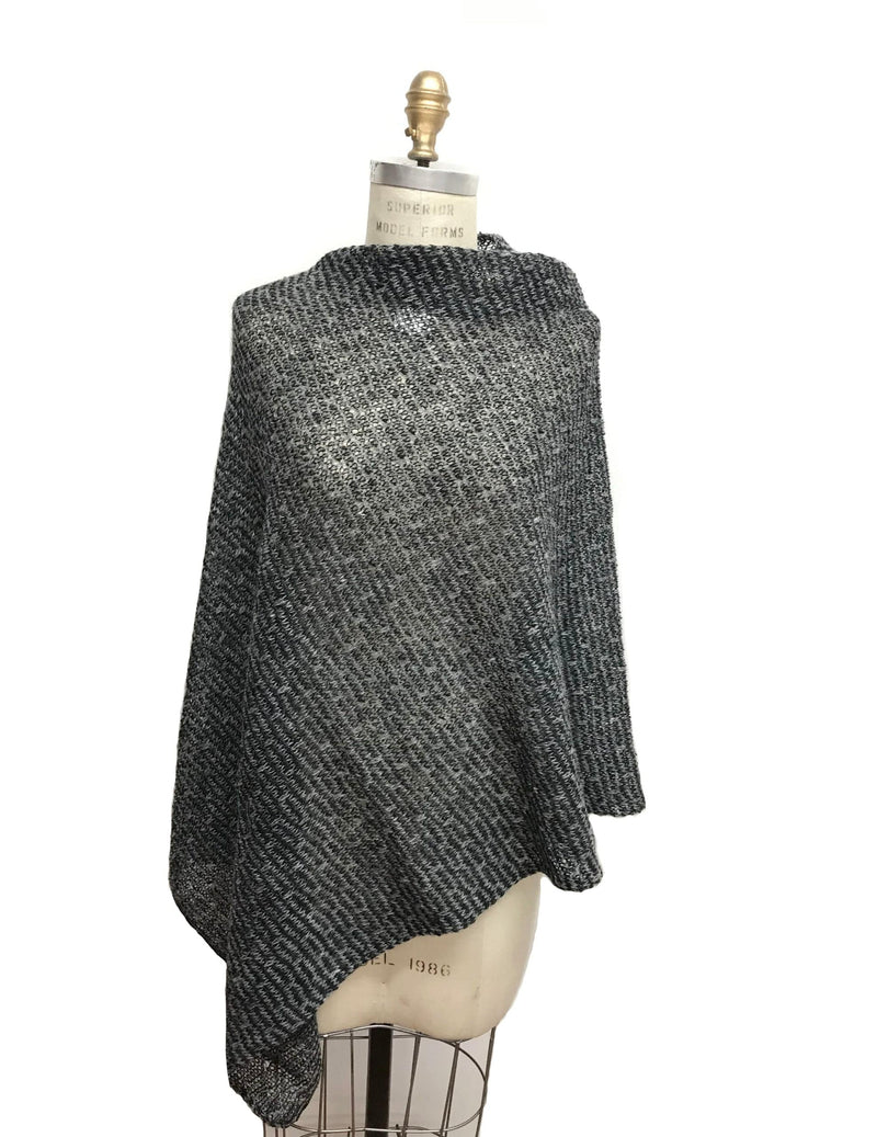 Light wool poncho from Iceland. Black and grey