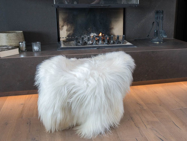 Icelandic Sheepskin Rugs. Sheepskin covers for chairs and sofas and bench and beds