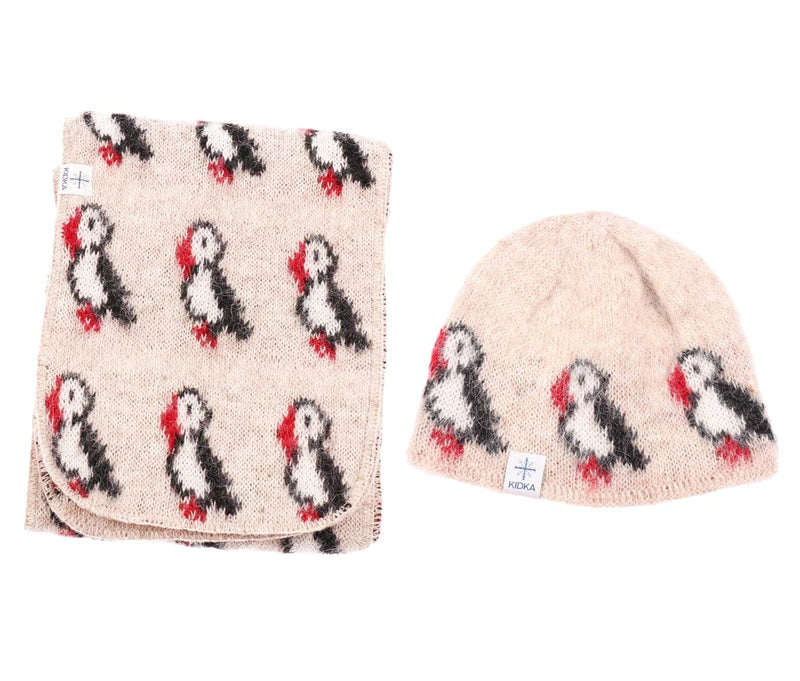Knitted beige woolen beanie and scarf with puffin. Iceland design